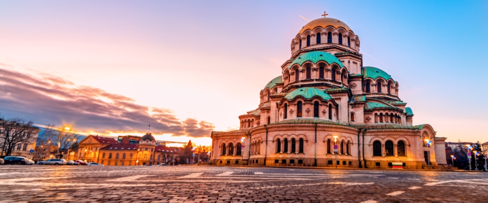View of Alexander Nevsky Cathedral in Sofia at sunset, Bulgaria's most famous historical monument.